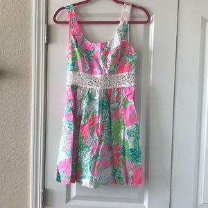 Lilly Pulitzer sundress with lace detail at waist.